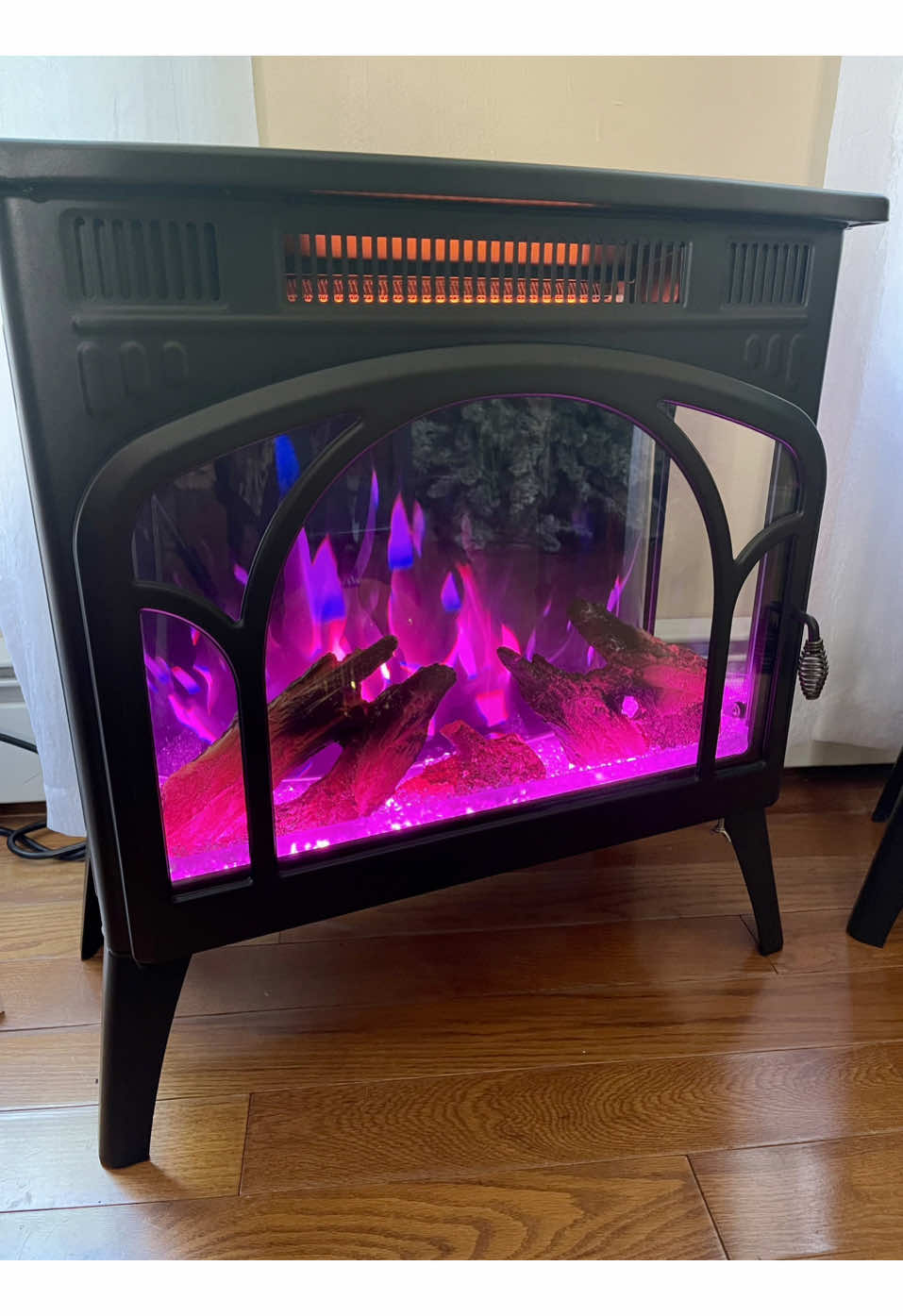 Stay toasty warm with your heated electric fireplace! These change color and they are so beautiful and so cozy!  #homefinds #fireplaces #tiktokshopblackfriday #fireplace #giftsfordad