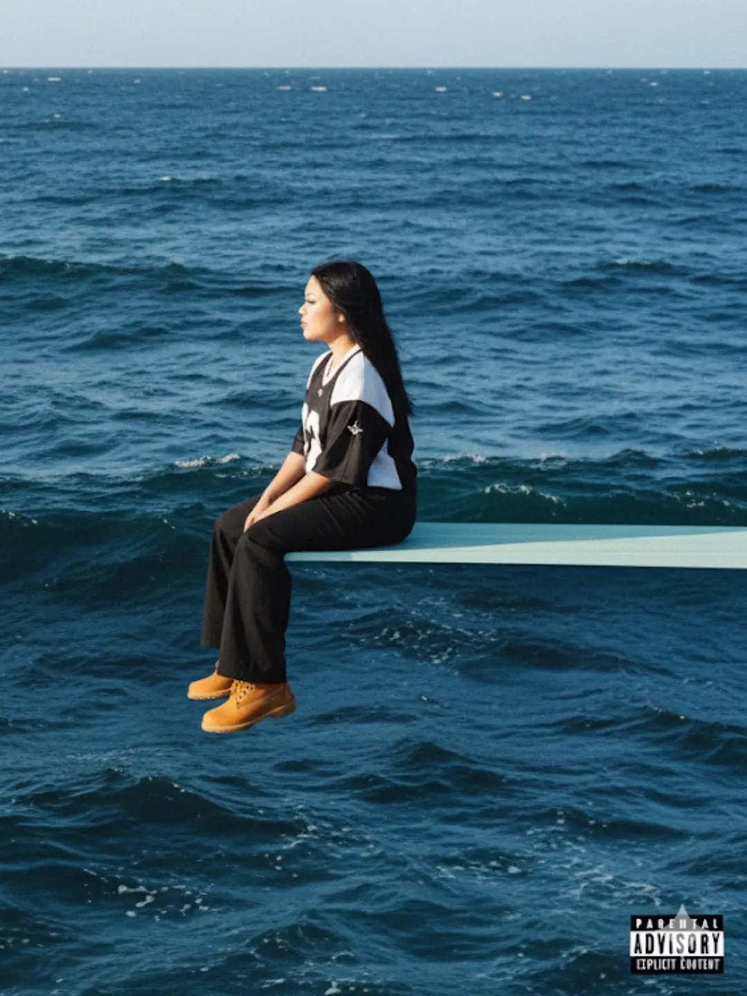 Here ya guys go :  A square-format album-cover scene of alone subject [person in the image] sitting in relaxed profile on the very tip of a white spring diving board that just in from frame right over a vast ocean; no horizon or land visible-only layered,choppy waves filling the frame; Subjects wears an black and white athletic jersey, black wide baggy pants and timberland brown boots; composition matches precisely-the subject is placed on the right third,camera at eye level in three- quarter profile facing frame left with chin slightly lifted, legs dangling,hands resting on the knees, and the diving board nearly horizontal as a clean leading line; sea color tones are dominant and specific; deep indigo base with Prussian blue mid-tones, teal cyan highlights on wave crests, cool slate-blue shadows, and near-black troughs with subtitle silver specular glints-overall cool blue-hour pallete; lightning is soft, diffuse late-day with gentle falloff; add fine film grain, faint halation, slight vignette, mild matte curve, and restrained contrast; shot with a 35mm film look using 135mm telephoto equivalent at f/4. 1/500s. ISO 400 for crisp focus on subject and board with medium-deep depth to keep wave texture legible; include a small “Parental Advisory: Explicit Content” label tucked into the bottom-right corner matching commercial album art conventions #sza #geminiai #ai #kim 