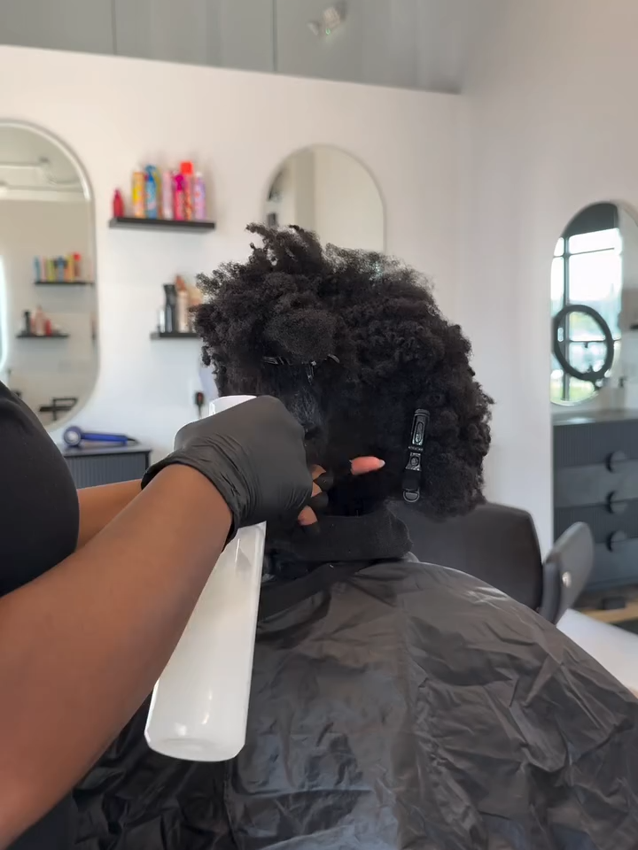 Braided Updo 💁🏾‍♀️ Hair off the neck ✅ Protective style ✅ Minimal tension ✅ DM to book your appointment today! #HairStylist #HealthyHair #ProtectiveStyles #NaturalHair #HairCare #HairTransformation #HairSlayed #SalonVibes #HairGoals #metrodetroit #4chairstyles #trending