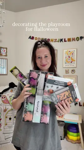 decorating the playroom for halloween 👻 the garlands are from tj maxx, the paper bats/spiders are from walmart and the discoball ghost and pumpkin are from target #halloweendecor #playroominspo #playroomdecor 