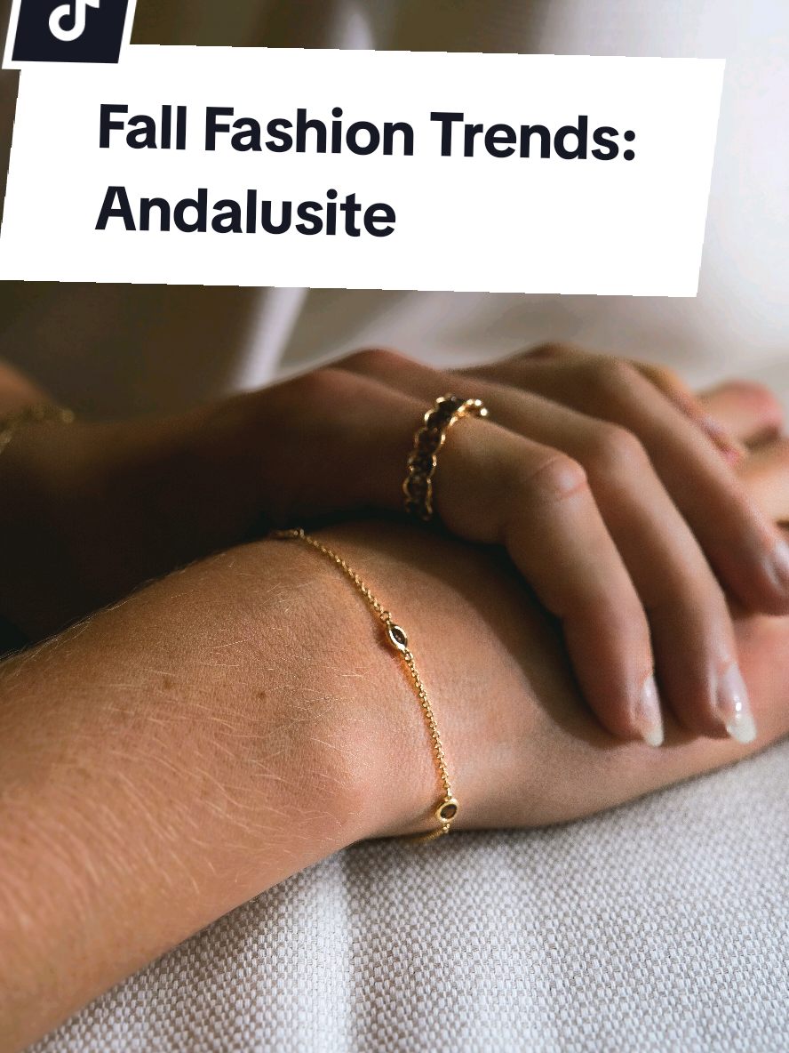 Andalusite is my favorite fall fashion trend. It's beautiful warm brown and green color makes it perfect for fall, especially when set in a warm yellow gold.  #fallfashion #fallfashiontrends #falloutfits #goldjewelry #itgirlaesthetic 