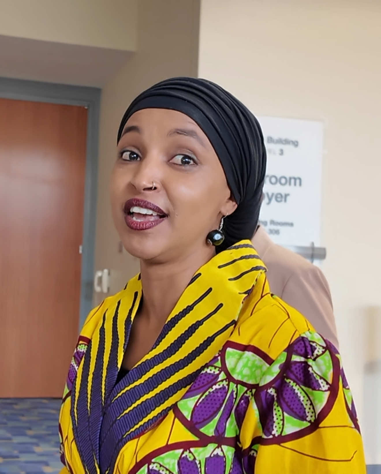 Rep. Ilhan Omar, D-Minn., reacts to President Trump asking the President of Somalia to take her back 
