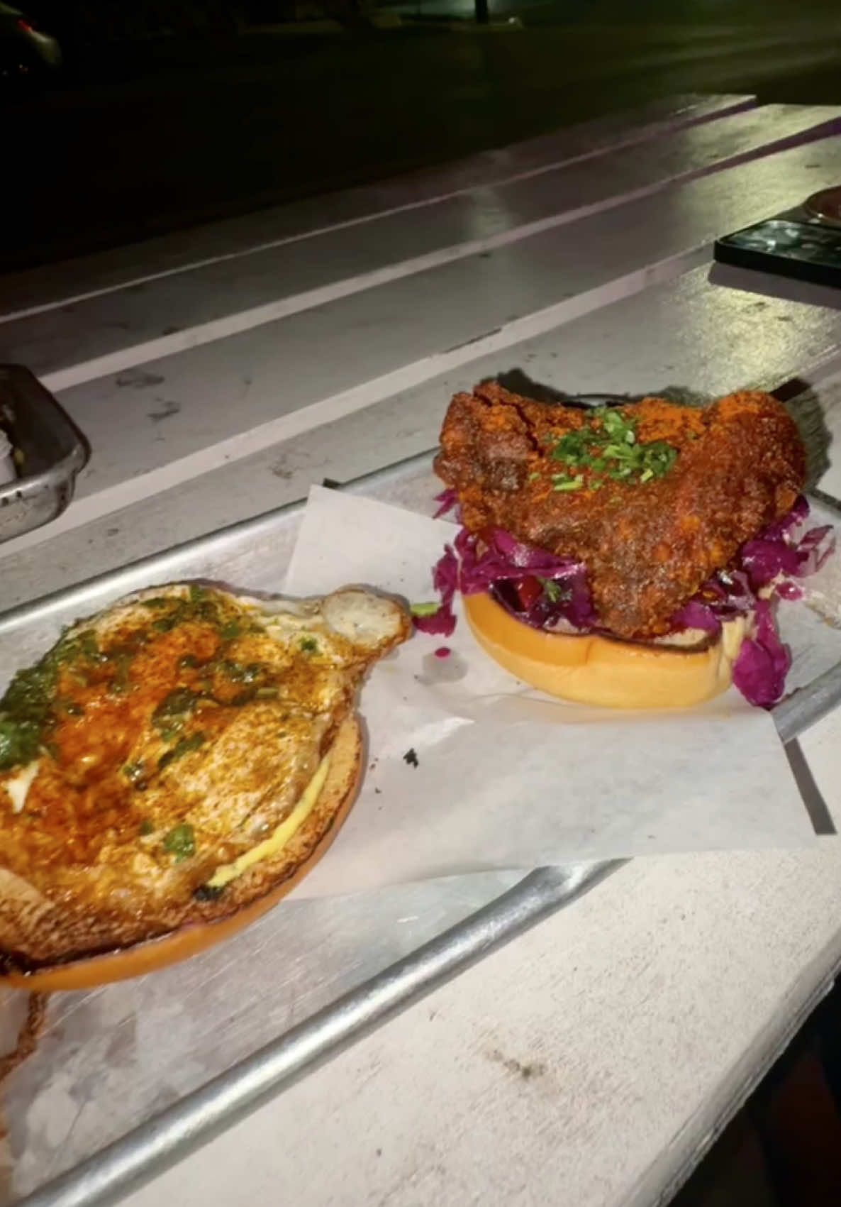 Cullum’s Attagirl 🍗🔥  J.A.C. Hamburger – 7.5/10 The burger was delicious, made with wagyu beef. You can tell they wanted the juiciness of the meat to shine because they kept it simple without extras like sauce or veggies. They definitely nailed that, but personally, I love a more ‘complete’ burger with some veggies in the mix. Wings – 8/10 Crispy and juicy! They’ve got different flavors, if you like heat, go Nashville Hot. The SA Hot is unbearable for me, so beware 😭 I usually get the OG wings with hot honey 👌🏼 Bonus: wings are 1/2 off on Wednesdays. Nashville Hot Chicken Sandwich – 8/10 Great balance of spice and freshness with the slaw. The egg on it is elite. Thyme Fries – 9/10 A must every time! Perfect fries. Ranch – 9/10 I dream about this ranch. It’s runny, dilly, and pairs perfectly with the wings, fries, AND the sandwich. Margaritas – 5/10 They’re $5 on Wednesdays. I’ve never been someone who craves fried chicken, but this has become one of our late-night go-to spots. 💵: $$ (Usually $30–$60 for two. Cheaper on Wednesdays with wing deals.) ⭐️: 4/5 📍: 726 E Mistletoe, San Antonio, TX 78212 #grublogs #fyp #sanantonio #friedchicken #FoodTok