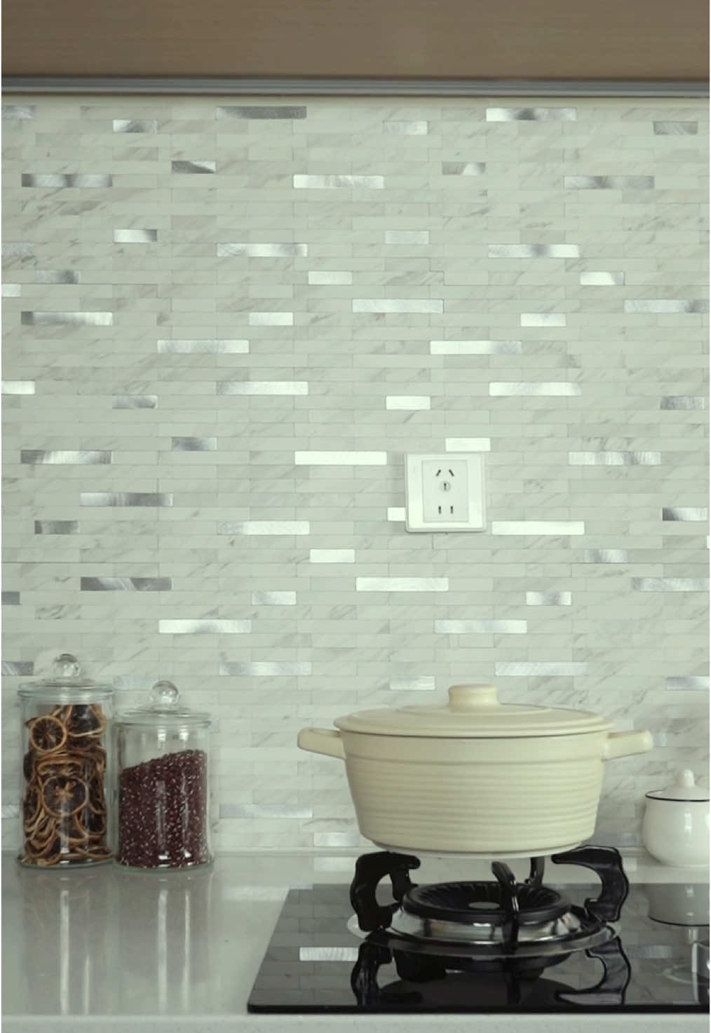 I put them in my kitchen, and it looks amazing! #stickgoo #peelandsticktile #homeimprovement #kitchendesign #kitchenupgrade #peelandstickbacksplash #DIY #falldiydecor #backsplash #homedecor 
