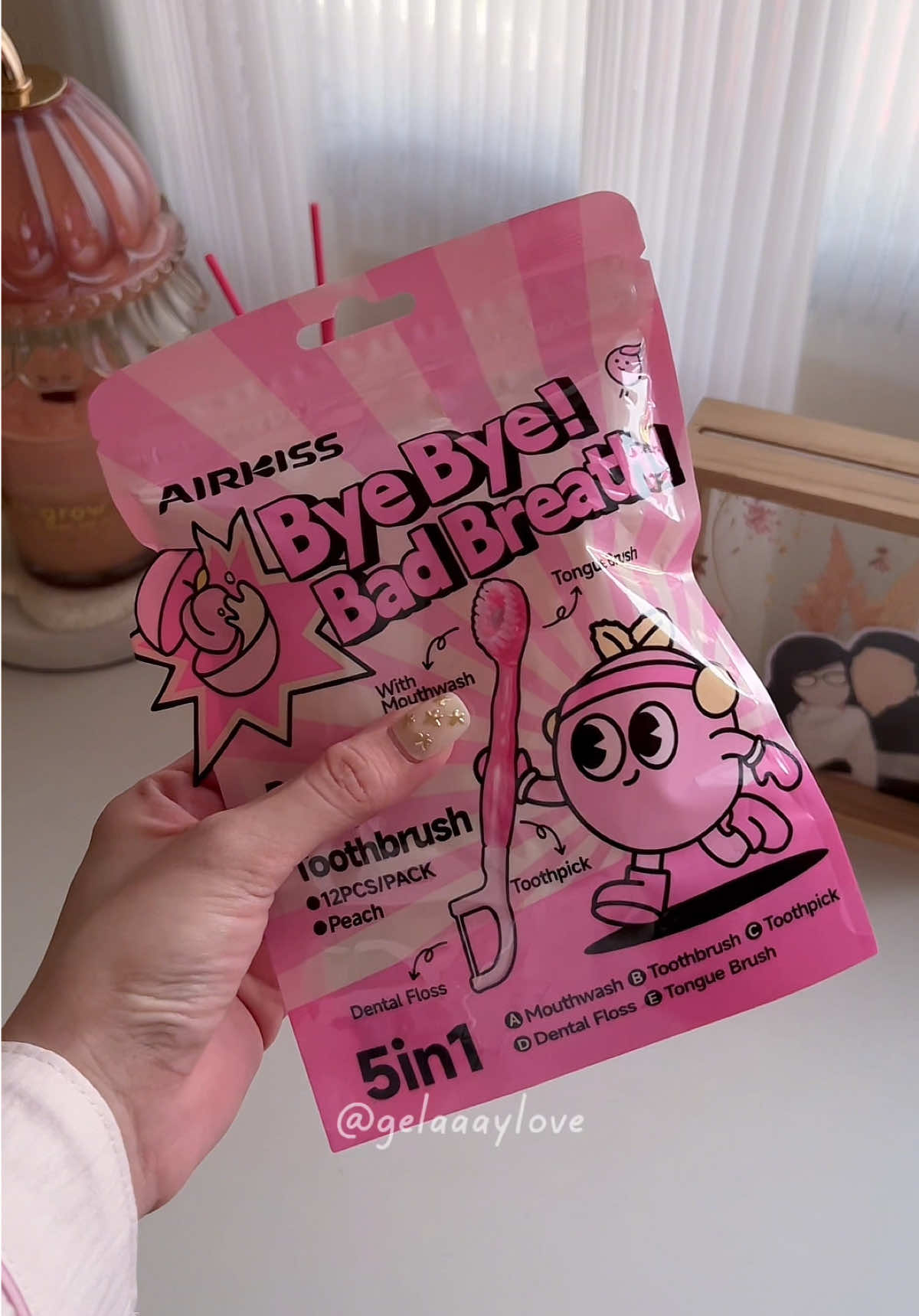Travel toothbrush with floss but make it pink 💘 #airkisstoothbrush #traveltoothbrush #toothbrush #airkissbyebyebadbreath 