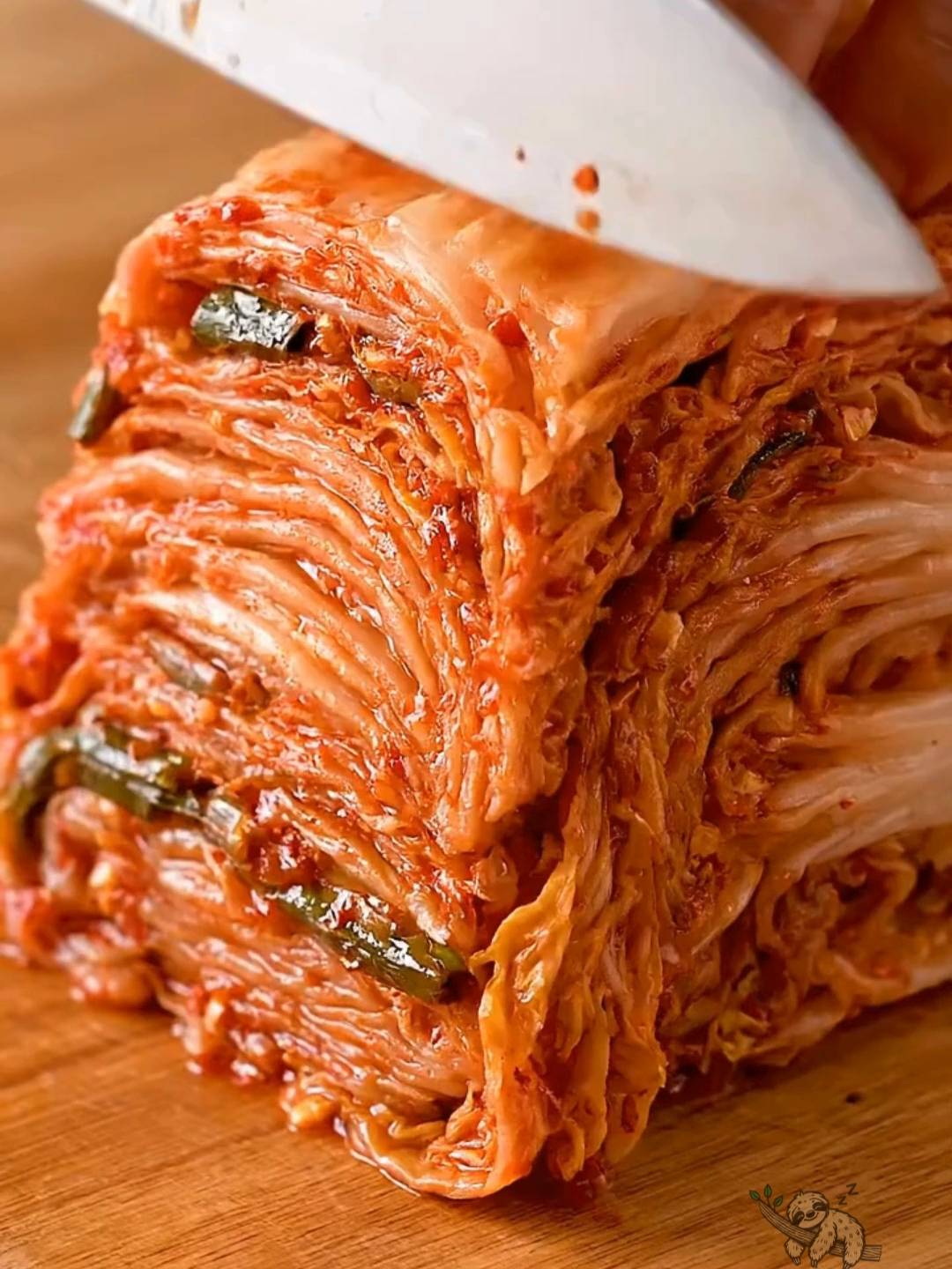 Freshly Sliced Kimchi – Flavorful & Irresistible! A vibrant cut of fresh kimchi, bursting with savory, tangy, and spicy Korean flavors. This traditional dish, made from fermented napa cabbage and rich spices, is not only delicious but also packed with health benefits. Perfect as a side dish with warm rice or as a flavorful companion to your favorite meals! #Kimchi #KoreanFood #FermentedFood #Foodie #HealthyEating #SideDish #FoodLovers #KoreanCuisine #SpicyFood #Delicious