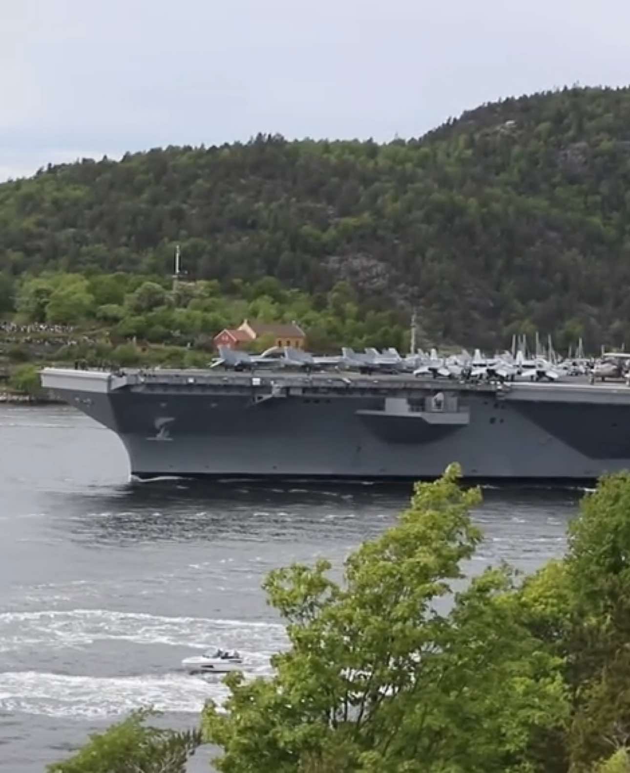 The U.S. Navy nuclear-powered aircraft carrier USS Gerald R. Ford (CVN-78) Sailing Past Oscarsborg Fortress - Oslofjord, Norway.