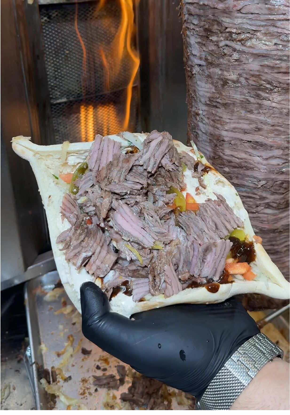 Our beef and lamb shawarma on our freshly baked samoon bread😍🇮🇶 Follow @sumaqbbq for more! 📍1961 Lawrence Ave E, Scarborough 📍3920 Eglinton Ave W, Mississauga #shawarma #torontofood #iraqifood #shawarmalovers #foodtiktok 