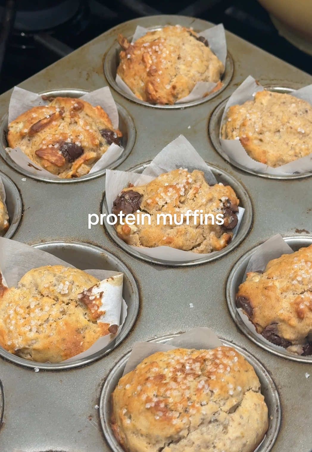 PROTEIN MUFFINS 🥰 recipe included below 🧁 (petition to have a muffin emoji??) #Recipe #protein #muffins #proteinrecipe #food  RECIPE: 2 cups AP flour  2 servings vegan protein  1 tsp baking powder  1 cup buttermilk / vegan buttermilk 1 cup vegan yogurt  1 tsp vanilla extract 2 eggs / vegan egg replacement  1/4 tsp salt   1/2 cup nondairy milk if needed to thin out batter  Any mix ins your heart desires 🙂‍↕️🙂‍↕️ Bake at 350° for 25-35 minutes🤎