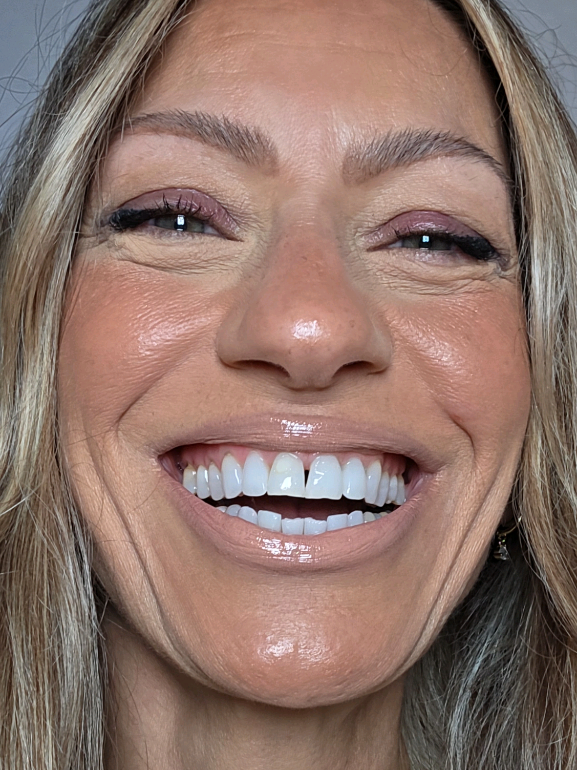 Dewy glowy luminized skin over 50 with the peach and lily luminizing stick. #makeupover50 #matureskinmakeup  #glowyskin #dewyskin #glassskin 