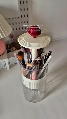 Automatic lifting brush holder? YES PLEASE 😍 #makeuporganizer #makeuporganization #makeupstorage #organizingmakeup #acrylicorganizer 