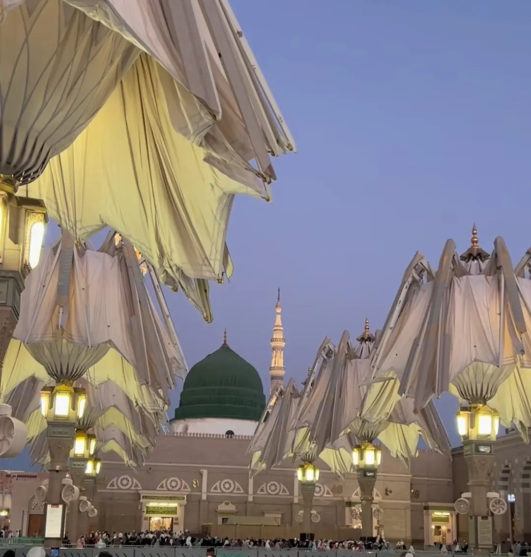 madinah munawra Madinah, the City of the Prophet, shines bright A beacon of faith, where Islam's history takes flight The Masjid an-Nabawi, a mosque of grandeur and might Where the Prophet Muhammad's tomb is a sacred sight The city's streets are lined with date palms, green and tall A tranquil oasis, where faith and peace enthrall Madinah's rich history and heritage are palpable and realMadinah's rich history and heritage are palpable and real A place where Muslims from all over the world come to feel The city's warm hospitality and welcoming smile Make it a place of pilgrimage, worth traveling a long while #plztiktokteamdontunderviewmyvideos #foryoupageofficiall 