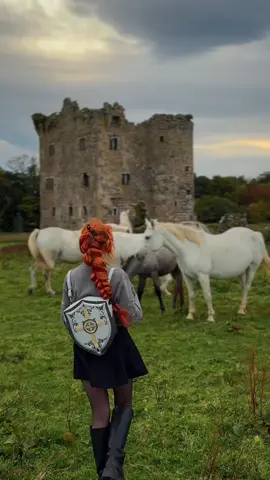 Casual castlecore outfit in the new dragon sweatshirt I designed with @lochersparis! It’s available to order now, along with my mouse knight “kill them with kindness” design. ⚔️ shield backpack by @norah ⚔️🛡️#castlecore #knight #romantasy #princesscore #castle 