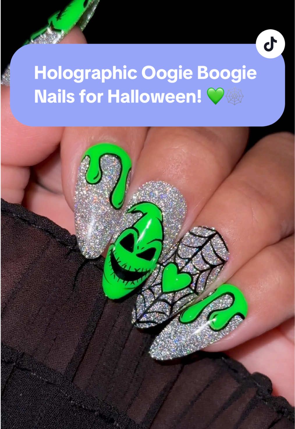 The cutest Holographic Oogie Boogie Nails for Halloween! 💚✨🕸️  💅 Everything used for this look is from the brand Daily Charme & is listed below. All goodies are available now in our TikTok shop or via the 🔗 in bi0 💖 Save & share for spooky nail inspo! 🎃 Using @daily_charme: • H61 Suncatcher (base) • N07 Sour Patch • 001 Perfect Black • 01 Thin Liner Brush • Diamond Shine Top Coat • Medium Almond Clear Extension Tips #halloweennails #oogieboogienails #nightmarebeforechristmasnails #spookynails #cateyenails         
