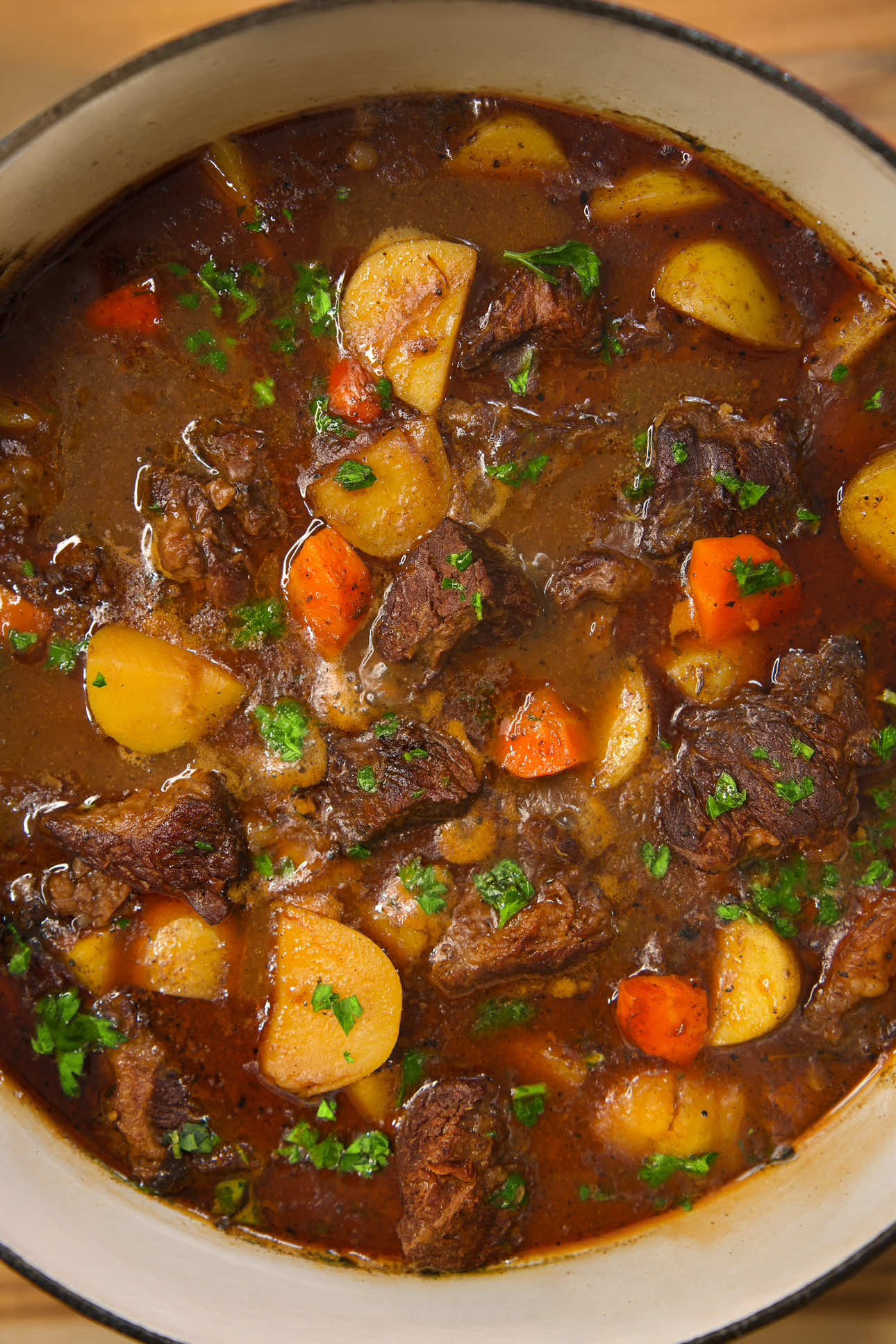 The Best Homemade Beef Stew Recipe  Yield - 10 Servings  Chuck Roast - 3 Lbs Chuck roast, cut into 1-inch cubes 1 tbsp Olive Oil (plus more for cooking) 1 Tbsp Onion powder 1 Tbsp Garlic powder 1 Tbsp Coarse Salt to taste Coarse Black Pepper to taste  1 Tsp Paprika  3 Tbsp all-purpose Flour  ———————— For the pot - 1 lb Baby Yukon Potatoes,halved  1 Large Yellow Onion,Diced  Drizzle of Olive oil  3 Bay leaves  Bundle of Thyme  2 Sprigs Rosemary  2 Carrots, Sliced into chunks  3 Stalks Celery, Chopped  7 Cloves Garlic, minced 6 Cups Beef stock (Low Sodium) 1 Cup Red wine (optional, Cabernet Sauvignon) 3 Tbsp Tomato paste  Fresh parsley, chopped for garnish  ———————————— https://www.thatsavagekitchen.recipes/recipes/classic-beef-stew ————————- #winterrecipes #thatsavagekitchen #stew #beefroast #comfortfood    —————————