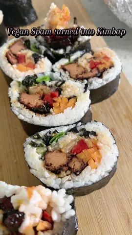 Vegan Spam Kimbap ✨ Vegan spam fried in soy sauce with vegan oyster sauce paired with vegan kimchi, carrots, bell peppers, a sprinkle of bbq toasted nori, a squirt of vegan mayo, and green onion with leftover sushi rice.  This was such a great lunch! Who knew cooking with vegan spam could be so delicious? 