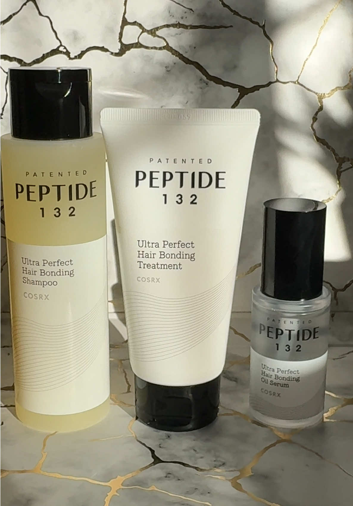 🧴 gifted by COSRX  @COSRX Official @Amazon  🫧Peptide-132 Ultra Perfect Hair Bonding Shampoo  ✨Powered by COSRX’s patented ✨PEPTIDE-132 to repair and strengthen from within  ✨Resets scalp health with targeted care (caffeine, zinc PCA, piroctone olamine)  ✨Purifies and rebalances roots for a fresh, lightweight feel  ✨Calms itchiness, controls flakes, and reduces excess oil  ✨Supports healthy, resilient strands from root to tip    🫧Peptide-132 Ultra Perfect Hair Bonding Treatment  ✨Smooths dryness, tangles, and split ends in one step  ✨Rebuilds strength with proteins, amino acids + keratin  ✨Leaves hair silky-soft, glossy, and tangle-free  ✨Works for all hair types - especially damaged, dry, or color-treated     🫧Peptide-132 Ultra Perfect Hair Bonding Oil Serum  ✨Instantly smooths frizz, flyaways, and brittle ends  ✨Repairs broken bonds and restores silky strength  ✨Boosts shine and bounce without greasy residue  ✨Lightweight + non-sticky texture  Great for all hair types - especially dry, damaged, or color-treated  gifted by COSRX  @cosrx_official @amazon #cosrx #bondingpeptide132 #silkhair #hair #beautifulhair #gifted_by_cosrx 