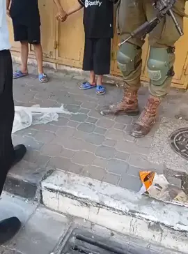 @Translating Falasteen 🚨Israeli soldiers detained two Palestinian children, accusing them of being spies in Al-Khalil, West Bank today. When passersby questioned why such young children were detained, the army told the to stop filming. The soldiers demanded to know where the boys' father was and detained them for a while before multiple soldiers went to the family's' house, preventing activists from following them. The soldiers then harassed and threatened the shopkeepers who were trying to support the children. This is the everyday violence of the occupation in Al Khalil where Israeli soldiers routinely terrorise Palestinians outside their homes without impunity. @ISMPalestine