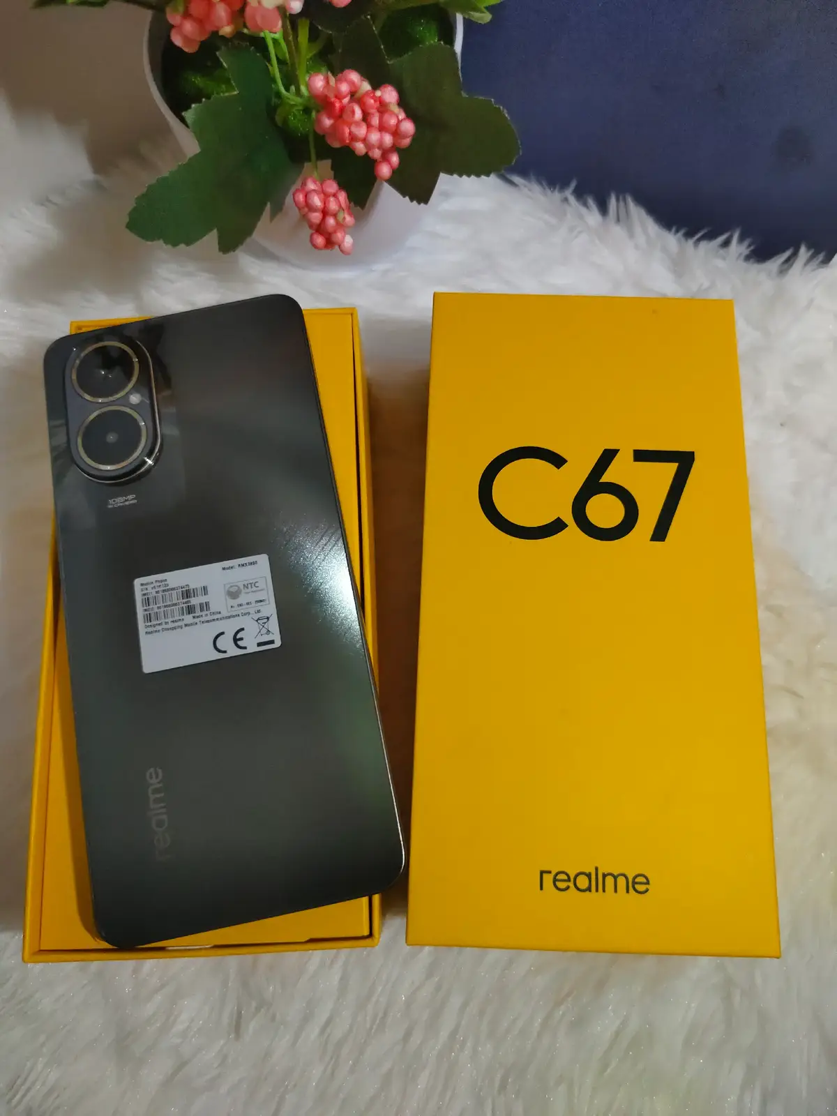 The Realme C67 is good for its 108MP camera, which uses an ISOCELL HM6 sensor and offers 3x zoom, providing excellent photos for a budget phone. Other positives include its vibrant, large 90Hz display with slim bezels and high peak brightness, the functional Mini Capsule 2.0 for notifications, dual stereo speakers for immersive audio, and IP54 dust and splash resistance. It also boasts a long-lasting 5000mAh battery with 30W charging, a 3.5mm headphone jack, a 3-card slot for dual SIM and microSD, and runs on the relatively current Android 14.  #realmec67 