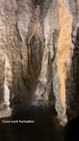 Unique cave rock formation with water flow 🌍 #nature