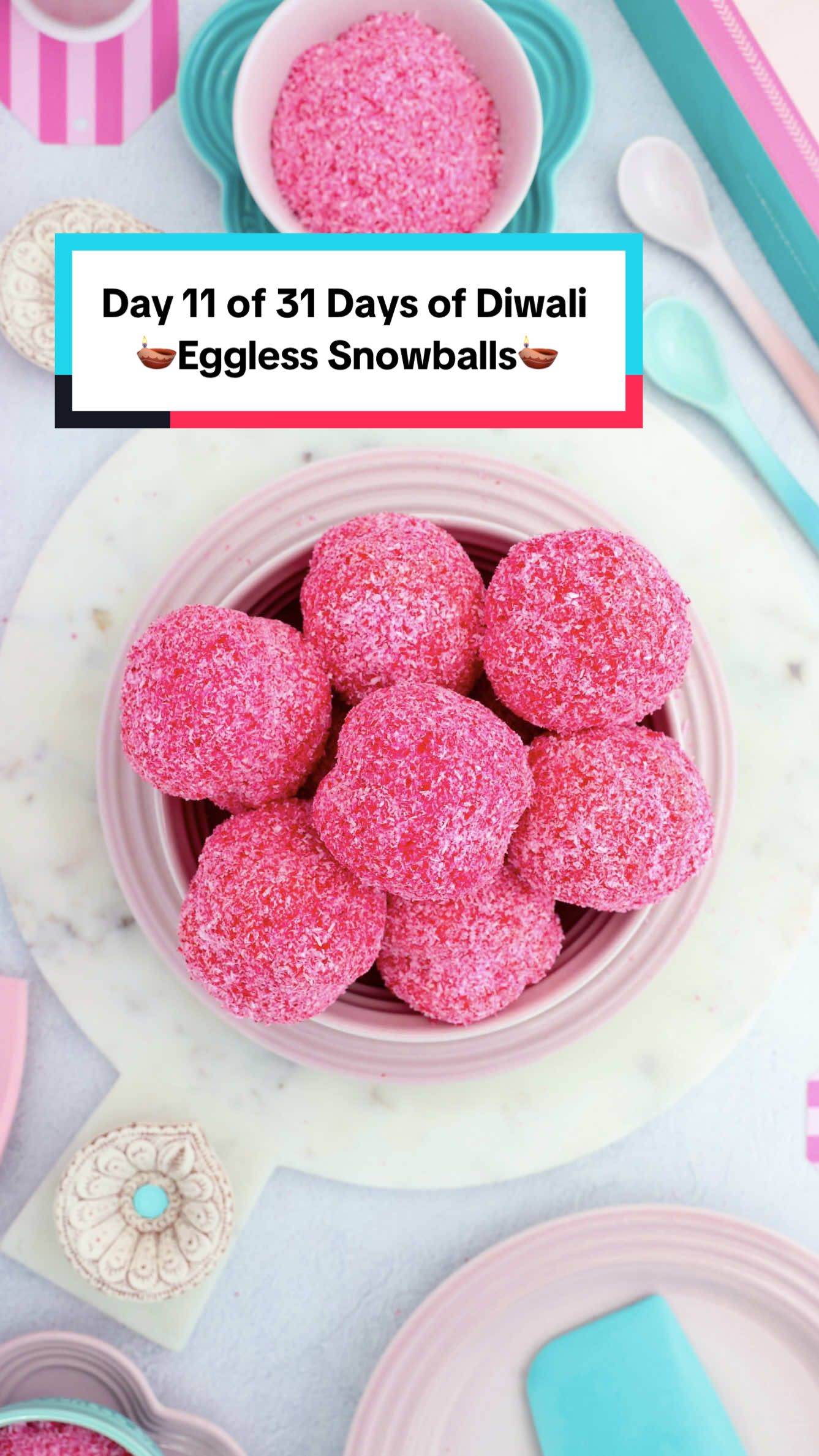 🪔Day 11 of 31 Days of Diwali - Eggless Snowballs🪔  Two delicious cakey biscuits, baked to golden perfection, sandwiched together with an irresistible glaze, then dunked in a decadent syrup and finished off with a coating of blushing, pink coconut. This is one of my recipes that is a must try, everyone who’s tried, has absolutely loved. One my followers even started a business my making and selling them. Definitely give this one a go. The recipe is below! Happy Baking👩🏽‍🍳 Recipe: Eggless Snowballs Makes: 12 Prep: 20 minutes Bake time: 15 minutes Difficulty level: Medium  Ingredients  Cakey Biscuit  140g  unsalted butter, softened  120g  condensed milk  4Tbsp buttermilk  1tsp  vanilla extract  250g  self raising flour Icing  250g Icing sugar  4Tbsp water Coconut coating  150g    desiccated coconut  A few drops of baby pink & electric pink food coloring  Syrup  250ml water 300g   sugar 150g    apricot jam      A few drops of baby pink & electric pink food coloring  Method  Cakey biscuit 1. Using a stand mixer or hand mixer, whip the butter till pale and fluffy. 2. Add in the condensed milk, buttermilk & vanilla extract and mix on a medium speed for 2-3 minutes. 3. Sift in the flour and mix till a soft dough is formed. The dough should be soft to the touch and not sticky. 4. Preheat the oven to 170^C. 5. Line a baking sheet with baking paper. 6. Using an ice cream scoop and a scale, scoop out 30 grams of dough. 7. Roll the dough into a ball. Place the ball onto the lined cookie. 8. Repeat the process until the dough is finished. 9. Remember to leave space between the balls as they do spread a bit. 10. Bake for 15 minutes and allow to cool completely on a baking rack before icing. Icing  11. In a large bowl combine the icing sugar and water together.  Mix till well combined. 12. The icing should be thick and smooth. 13. Sandwich 2 cakey biscuits together with a tablespoon of icing. 14. Place on a baking rack to set, it takes 2-3 minutes to set. Coconut coating  15. In a bowl, combine the desiccated coconut with a few drops of baby pink & electric pink food coloring. 16. Mix till well combined and the desired color is achieved. Set aside. Syrup 17. For the syrup, combine the sugar and water in a saucepan and bring to a boil.  18. Once at a boil, add in the apricot jam and whisk till well combined. 19. Once the syrup starts to thicken, add in a few drops of baby pink & electric pink food coloring. Mix well and remove from heat. Use while still warm. Bringing it all together  20. Dunk the sandwiched cakey biscuit into the warm syrup. Allow to absorb the syrup for about a minute. 21. Coat in desiccated coconut! 22. Enjoy immediately😋 #diwali2025 #snowballs #snowballrecipe  #fyp #diwalibakes                           