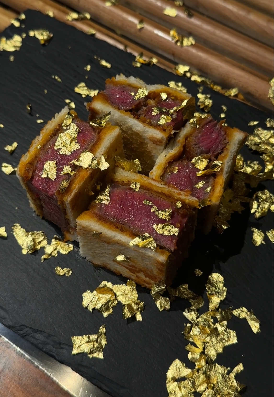 This GOLD Wagyu sandwich is unreal 🤯🥩✨ Found at Wagyu Teppanyaki Ousaka in Osaka 🇯🇵 — 4.8⭐ and crowned Travelers’ Best Choice 2025 🏆