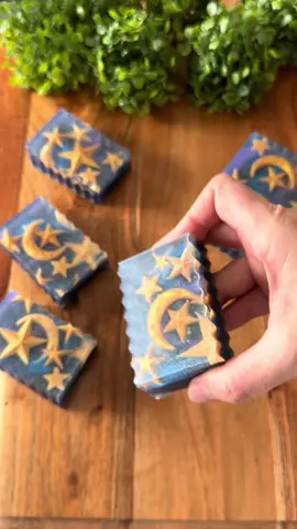 This artisan soap bar is full of golden moons and stars. See the satisfying cut as one big soap transforms into many mini cosmic pieces. Handmade soap making is always magical — relaxing, creative, and beautiful to watch. #soapcutting #soapart #asmr #galaxysoap #diyproject 