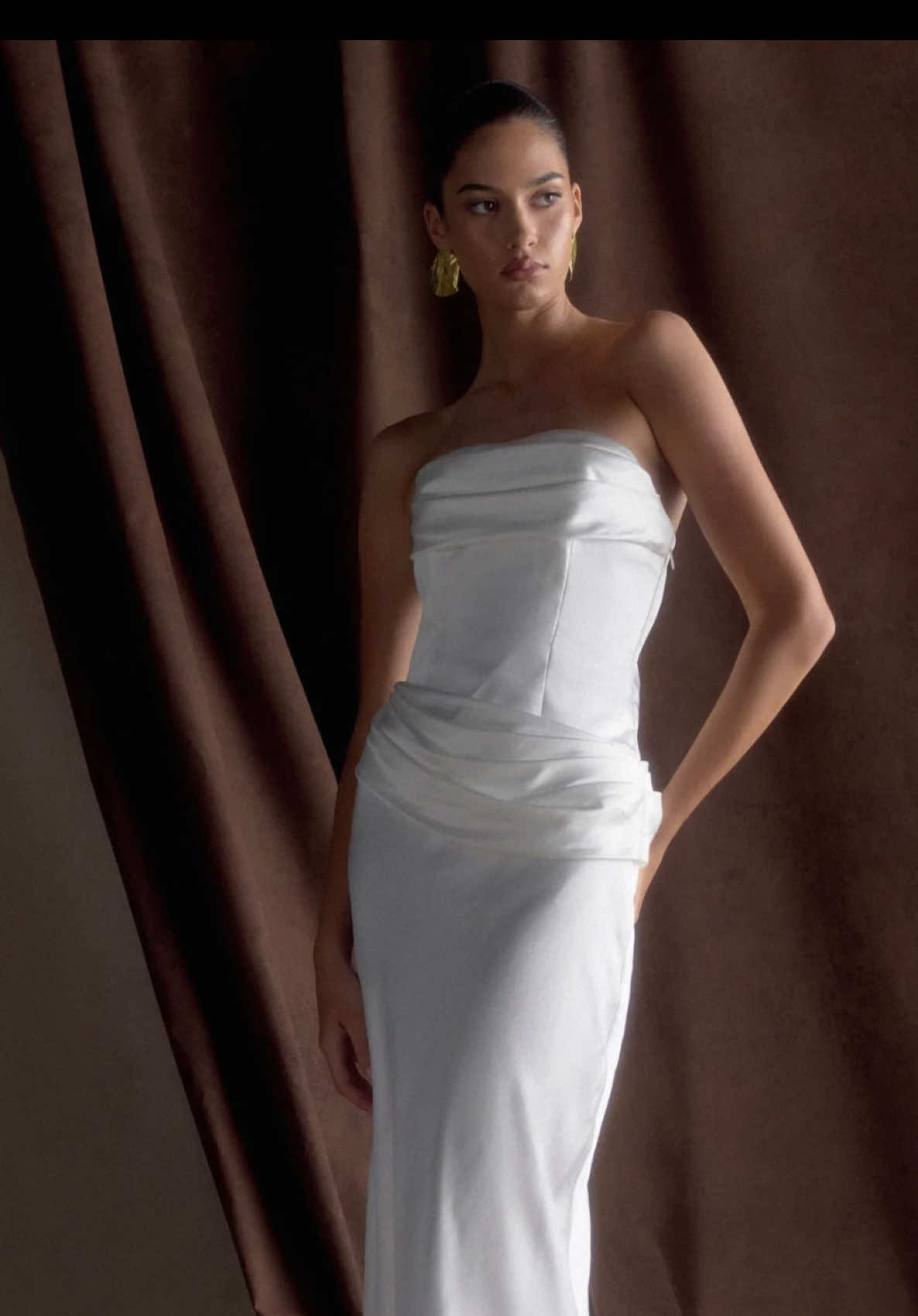 Her vows aren’t the only thing that’s strong. Our JASMINE maxi dress in White. As seen on @Valeria | Salads Days #MESHKI #bride #bridal #weddingdress #gymgirls 