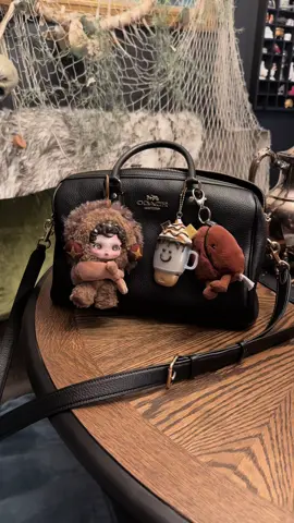 Gave #sneakychestnut a makeover and now I love her !! She was cute before but I’m loving her with the dark brown hair 🙌🏻 #skullpanda #bagcharms #sneakychestnutmakeover #skullpandapopmart #youfoundmeseries #skullpandayoufoundme #bagcharm #keychains #jellycat #jellycatcoffeebean #pursedecor #coachrowan #coachpurse #coachbag 