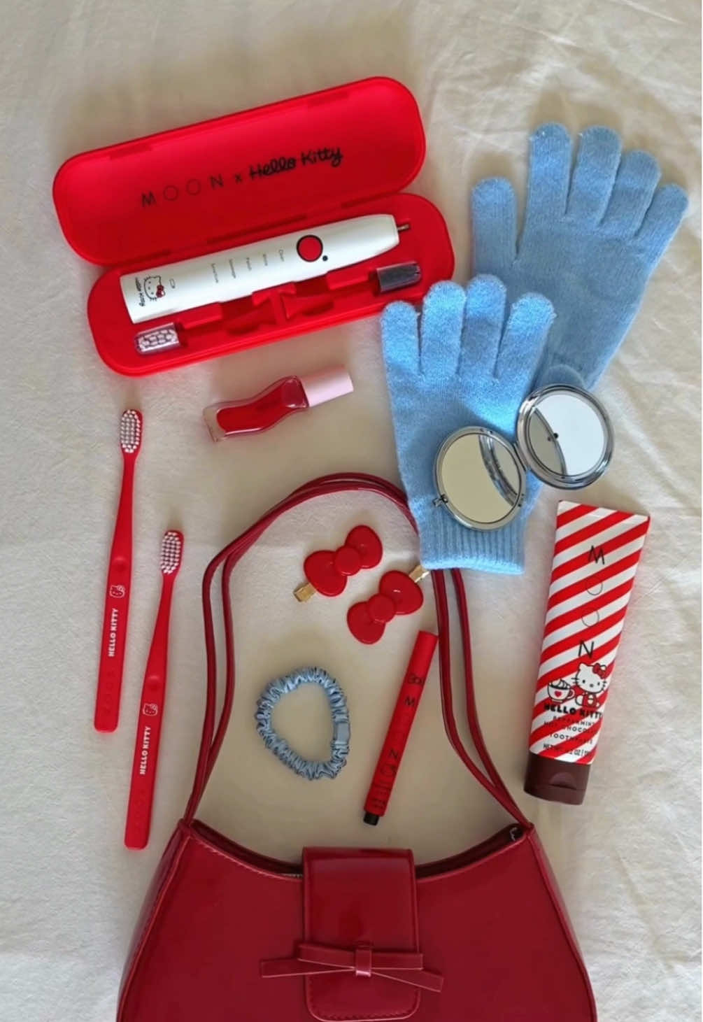 what’s in my bag... MOON x @hellokitty edition. #MOONxHelloKitty