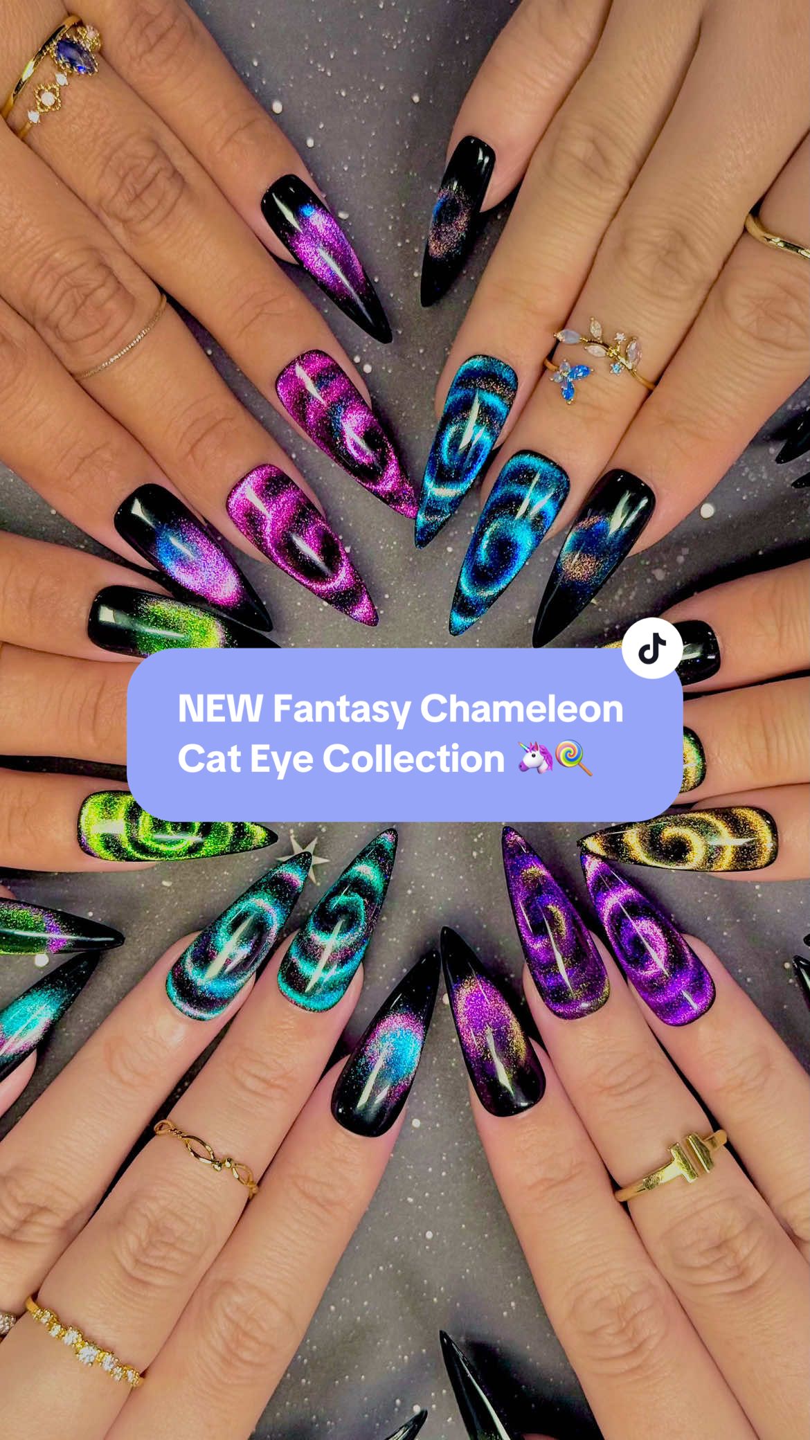 Explore a world full of color with the ✨ NEW ✨ Fantasy Chameleon Cat Eye Charme Gels! 🍭🦄 💅 Everything used for this look is from the brand Daily Charme & is listed below. All goodies are available now in our TikTok shop or via the 🔗 in bi0 💖 This new cat eye collection includes 6 magnetic gels that reveal stunning multi-dimensional colors at every angle for a true whimsical finish. Layer over a black base to reveal an explosion of vibrant fantasy. 🎆 Save & share for your next dreamy mani inspo!  6 new multi color-shifting cat eye shades: 🩷 E49 Euphoria 💚 E50 Nightshade 🩵 E51 Delirium  💜 E52 Nocturne  💙 E53 Obscura  💛 E54 Vespera  #cateyenails #magneticnails #nails #nailinspiration #cateyegel         