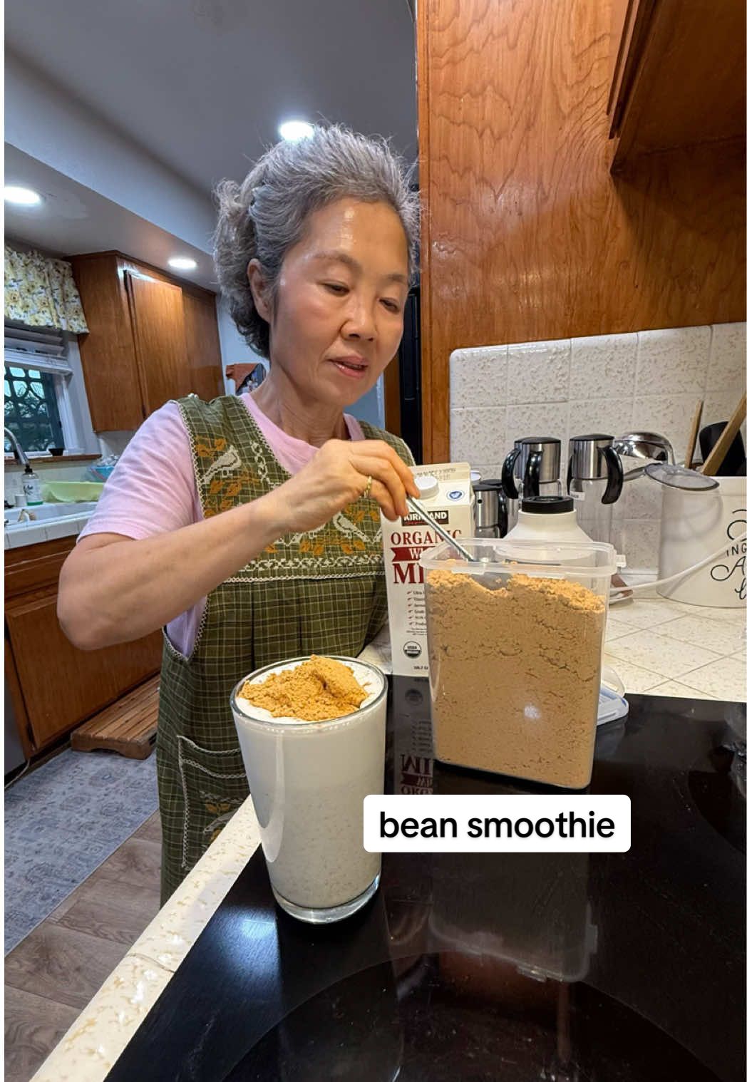 The bean smoothie my mom drinks every night, at least for now. It’s packed with 32 grams of protein. The Korean black soybeans + chickpeas were previously cooked in the instant pot for 7 minutes on a steamer basket.  Full recipe on our substack, but smoothie recipe below! 1 cup whole milk 2 heaping tbsp (30g) cooked Korean black soybeans  2 heaping tbsp (30g) cooked chickpeas  2 tbsp (20g) fermented soybean powder 1 1/2 tbsp (10g) brewer’s yeast powder (optional) 1. In blender, process milk, soybeans, and chickpeas. 2. Transfer to serving cup. Top with soybean powder and brewer’s yeast powder. Mix and enjoy. #koreanfood #smoothie #EasyRecipe #mealprep #milkshake 