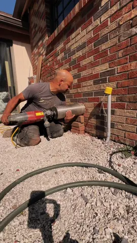 Centerless Handheld Coring a 6 ½” Hole Handheld with the Hilti DD 150  Coring through masonry without the aid of a drill stand is one of the most demanding techniques in the trade, and today we are tackling a 6 ½” penetration through brick veneer using the Hilti DD 150 in handheld mode. In many jobsite conditions, it’s simply not possible to anchor a stand due to surface restrictions, structural limitations, or material fragility. That’s where handheld coring comes into play—but this method requires both skill and absolute control. The Hilti DD 150 offers the versatility to switch from rig-mounted to handheld operation, but success hinges on preparation and precision. Before starting, always ensure your core barrels are free of burrs or jagged metal edges by running your hand along the barrel surface. Any imperfection can catch and create instability. The proper technique begins by initiating the core at a 15–20° angle, forming a shallow “U” track that allows the segment to bite gradually. Once the bit is seated and tracking, the tool can be leveled up to 90°. From this point forward, it’s all about maintaining a firm grip, applying steady pressure, and letting the diamond segment do the cutting. Handheld coring is not for the faint of heart, but with proper guidance, technique, and the right equipment, even large-diameter holes through challenging masonry can be achieved safely and efficiently. I hope you found this video helpful for your next project. Thank you for watching, and as always, Happy Building! #Hilti #DD150 #Coring #HandheldCoring #ConcreteCoring #BrickVeneer #MasonryWork #DiamondCoreBit #DrillRig #DrillStand #ConstructionTips #CoreDrilling #BuildingTrades #MasonryCoring #PowerTools #HiltiTools #ConcreteDrilling #SafetyFirst #CoringTechnique #DiamondTools #CommercialConstruction #ContractorLife #WallPenetration #TechnicalCoring #ToolDemonstration #DemoBoys