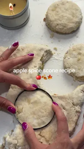 Spiced Apple Scones with Maple Glaze 🍎✨ Ingredients For the scones: * 2 ¼ cups all-purpose flour * ¼ cup sugar * 1 tbsp baking powder * ¼ tsp ground ginger * ¼ tsp ground nutmeg * 1 tsp cinnamon * ¾ cup cold unsalted butter, cut into 1-inch cubes * 1 cup Greek yogurt For the apple mixture:  * 2 cups diced apples * 2 tbsp brown sugar * Cinnamon (measure with your heart ❤️) For the glaze: * 1 cup powdered sugar * 1 tbsp maple syrup * 1–2 tbsp milk (add slowly for consistency) Instructions 1. Cook the apples: In a skillet over medium heat, cook apples with brown sugar and cinnamon until softened. Let cool completely in the fridge. 2. Mix the dry base: In a bowl, whisk together flour, sugar, baking powder, ginger, nutmeg, and cinnamon. 3. Cut in the butter: Add cold butter cubes. Use a pastry cutter or stand mixer paddle to blend until pea-sized crumbs form. 4. Add yogurt: Stir in Greek yogurt until just combined. 5. Add apples: Fold in 1 cup of the cooled apple mixture. Use your hands to bring together any loose flour. 6. Chill if needed: If butter feels soft, chill dough for 10 minutes. 7. Shape & cut: On a lightly floured surface, pat dough into a 1.5-inch-thick square. Rest for 5 minutes, then cut with a 2.5-inch cookie cutter. 8. Bake: Place scones on a parchment-lined baking sheet. Chill 10 minutes in the fridge. Bake at 355°F for 30–40 minutes, until golden brown. 9. Make the glaze: Whisk powdered sugar, maple syrup, and milk until smooth (you may only need ~1.5 tbsp milk). 10. Finish: Let scones cool, drizzle with maple glaze, and top with leftover spiced apples. #scones #applespice #bakingtok #fallbaking #sconesrecipe 