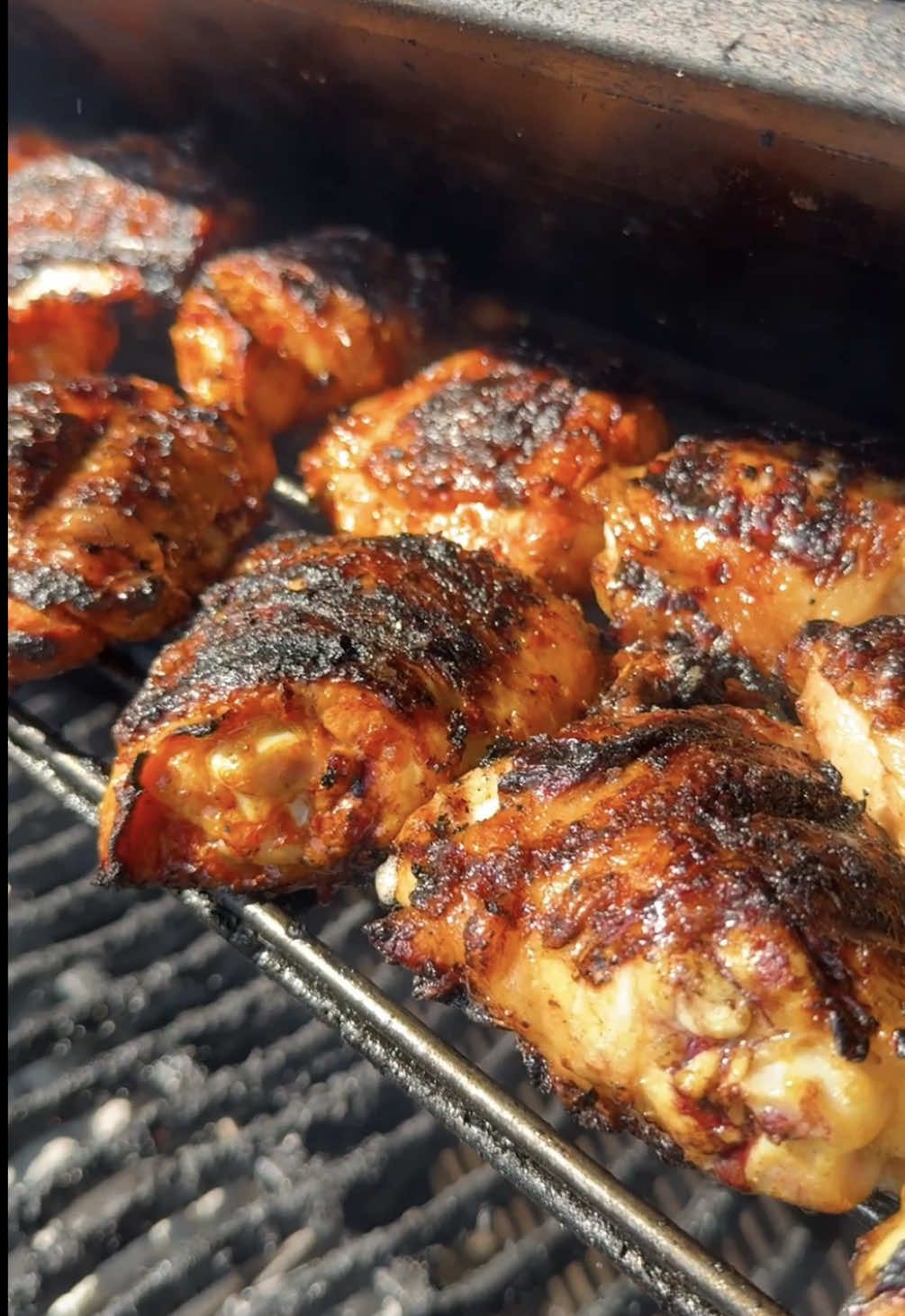 👀🍗🔥 Thighs That’ll Cross Yo Eyez Throwing down a serious marinated, bone in, skin on chicken thighs. Marinated overnight one in Piri Piri and other in Italian dressing, hit with salt and done over charcoal. This is my brother in laws dad’s grill, and it is seriously a fun unit to use and make work for my meaty dinner experiments. Full throttle thighs are elite over charcoal, extra smokiness from the coals, crispy skin, unbeatable…drinks were flowing so I missed some videos 🤷🏻‍♂️ also the grill was so hot we had to throw them way up up top for gentler heat with the lid cracked. 🔥 @Napoleon Products  🪵 @Charcoal Chariots  . . . #BBQ #Grilling #chickenthighs #cottage #CharcoalGrill 