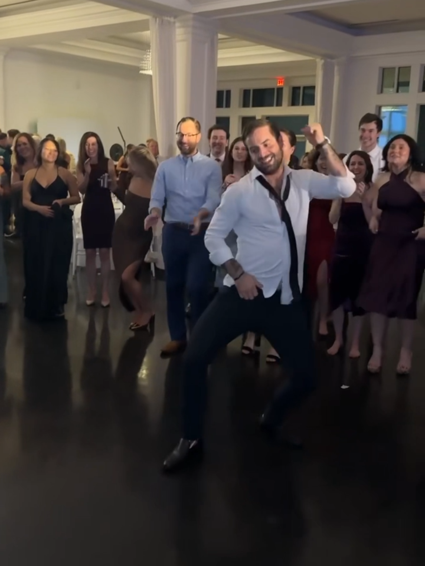 Conor Murphy stole the wedding dance floor when he dropped facedown and spun effortlessly in circles using only his tippy toes and fingertips. Guests were in laughter and cheers as Murphy’s unexpected performance turned into the highlight of the night. 😂🕺 Got a great video like this. Upload to Newsflare and turn your content into cash. Link in Bio⬆ #wedding #dance