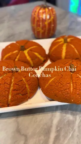 Brown Butter Pumpkin Chai Conchas need to be added to your fall baking list 🥰🎃 I hope you enjoy my recipe ❤️ Tangzhong (milk/flour paste)  35g Bread flour  170g milk  Yeast Mix:  100ml milk  40g Brown Sugar 10g yeast  Dough:  550g Bread flour  120g sugar  30g milk powder  6g sea salt  2 whole eggs  2 egg yolks 1/2 tsp cinnamon  1 1/4 tsp pumpkin pie spice  3/4 cup Pumpkin puree 2 tbsp vanilla extract  200g cold butter, browned then chilled  Paste:  135 g softened butter  135g all purpose four  135g powdered sugar  100g chai latte mix  Pumkin spice concha with chai  #panmexicano #mexicanrecipe #conchas #hispanictiktok #gringa 