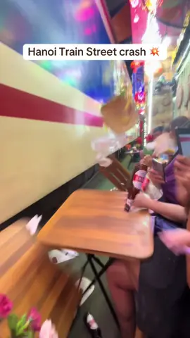 Train takes out tables on Train Street in Hanoi 🚋💥💥 #trainstreet #hanoi #touristmistake #scary #vietnamtravel 