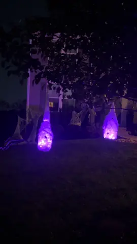 I couldn’t stop at just a giant spider… so I DIY’d some creepy glowing “egg sacks” too 🕷✨ How I DIY’d these creepy glowing spider “egg sacks”: 🕷 Cut a slit in old milk jugs to make stuffing them easier 🕷 Added dollar store glass stones for weight 🕷 Tucked in fairy lights + sealed the top so water can’t reach the battery pack 🕷 Glued on leftover “spider eyes” (aka Christmas ornaments 😂) 🕷 Covered with white pantyhose + added spiderwebs and plastic spiders 🕷 Hung them up in the tree for full spooky effect Now the real question… do I stop here or add even MORE spiders crawling out of the tree? 👀
