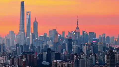 Shanghai's luminous skyline redefines urban beauty!🌃   Where Eastern charm meets Western architecture in a spectacular light display.   #Travel #TravelTips #China #Shanghai #UrbanPhotography