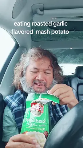 eating roasted garlic flavored mash potsto in my electric car #fyp #roastedgarlic #mashpotato #electriccar ##sugarinmytongue 