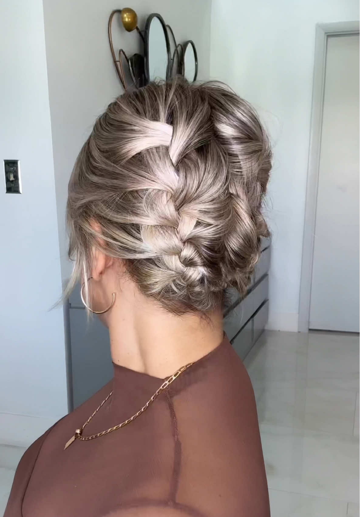 I remember when I was learning to braid… I would sit in front of the tv after university and focus mostly on hand placement. I kept thinking “my hands are not able to hold it all” I practiced and practiced… then my daughter was born years later and I got to practice on her… to this day I’m still learning new tips when I create a hairstyle… Braids have always been more than just a #hairstyle For centuries, they’ve carried meaning identity, power, community, artistry it’s all woven in♥️ Think about it… multiple strands coming together to create something stronger. That’s why braids often symbolize unity and strength. Isn’t that amazing?  I think this one can be worn anywhere really… for the gym maybe keep the braids tight or for an event romanticize it like me and tug the strands gently to fluff it up.  #bobhairstyles #hairstyle #shorthairstyles #updo 