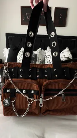 My new favorite bag! Charms & chain from Pin: @Spirit Halloween & Chain & horror charm @Five Below #fyp #bagcharms #tiktokshopfinds #tiktokshop #alternative 