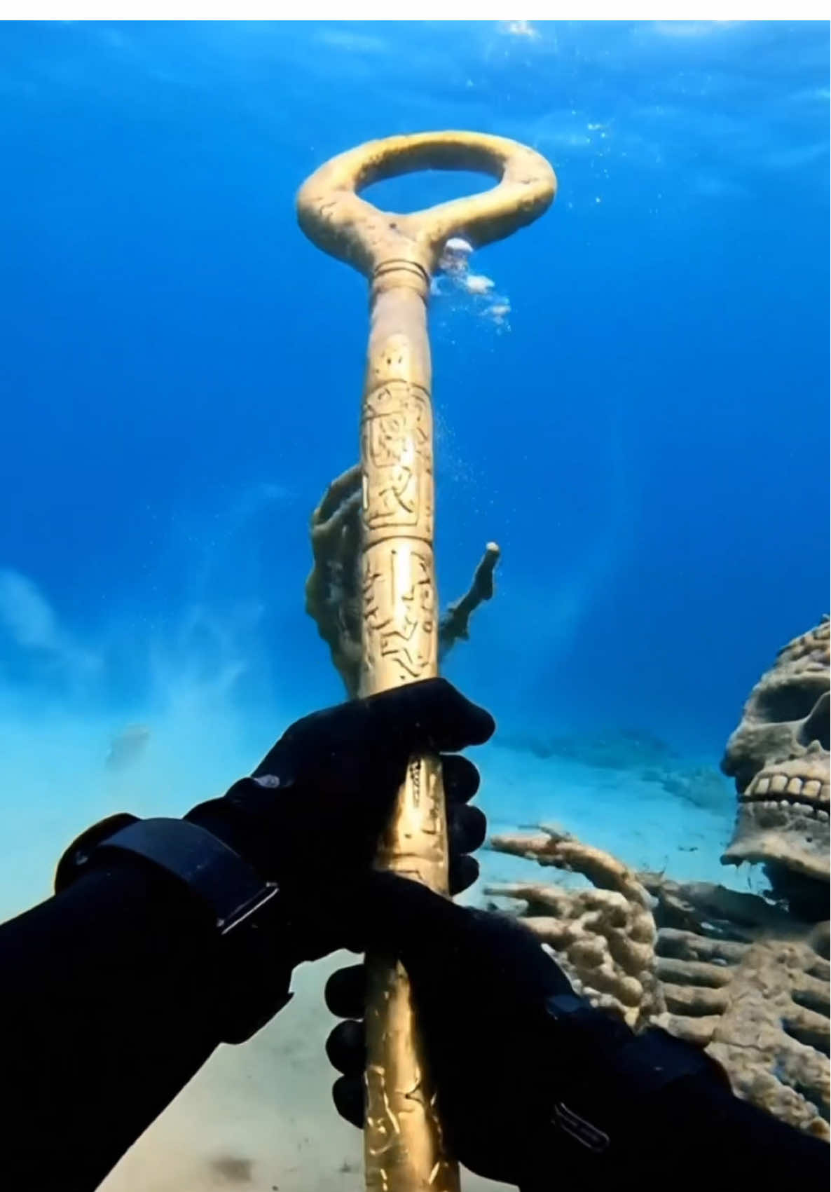 🌊✨ Exploring the Lost Aztec City Beneath the Waves ✨🌊 Imagine strapping on your gear and diving deep into waters where history sleeps… 🐠 From a first-person perspective, you swim through submerged ruins of Aztec temples and pyramids, brushing sand off golden masks, jade figurines, and ceremonial daggers. ⚱️ Your hands uncover relics—a staff still clutched by the skeletal hand of an armored Aztec warrior, ancient tablets etched with glyphs, treasures hidden for centuries beneath layers of silt. Not alone, your dive team moves with you—signaling through the murky water, shining lights into tombs, carefully placing artifacts into dive bags as clouds of sand swirl around them. 🪙💀 Every slow, shaky movement feels surreal—fish-eye POV realism in 8K detail—like you’re really there discovering a forgotten world, a city swallowed by time and water. #earthimpacts #googleflow #veo3 #ai #aivideos 