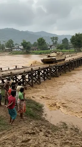 🌊 Disaster! A tank is crossing a wooden bridge when the bridge collapses! 😱🏚️ #FloodDisaster 