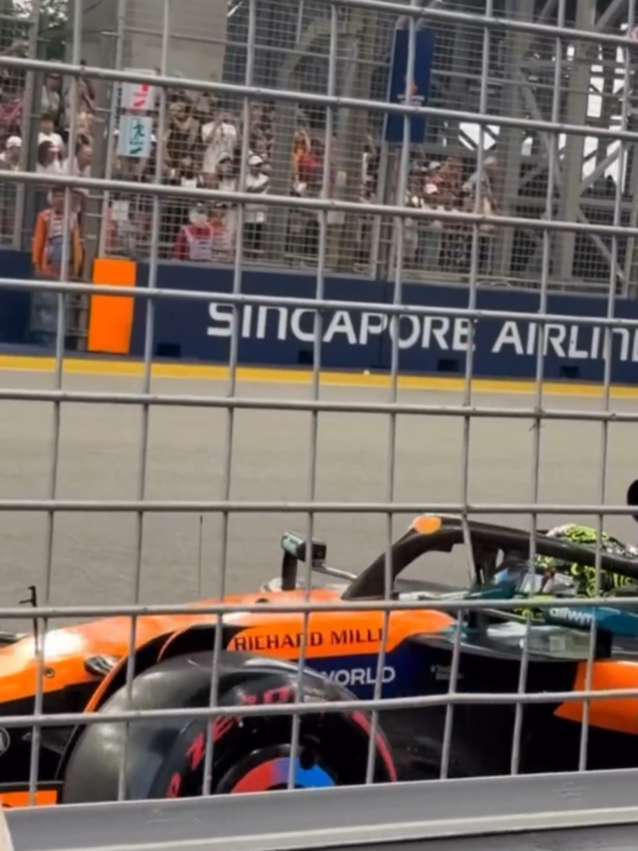 Yuki Tsunoda and Lando Norris leaving the pits during free practice 1 #F1 #yukitsunoda #singaporegp #landonorris #marinabay 