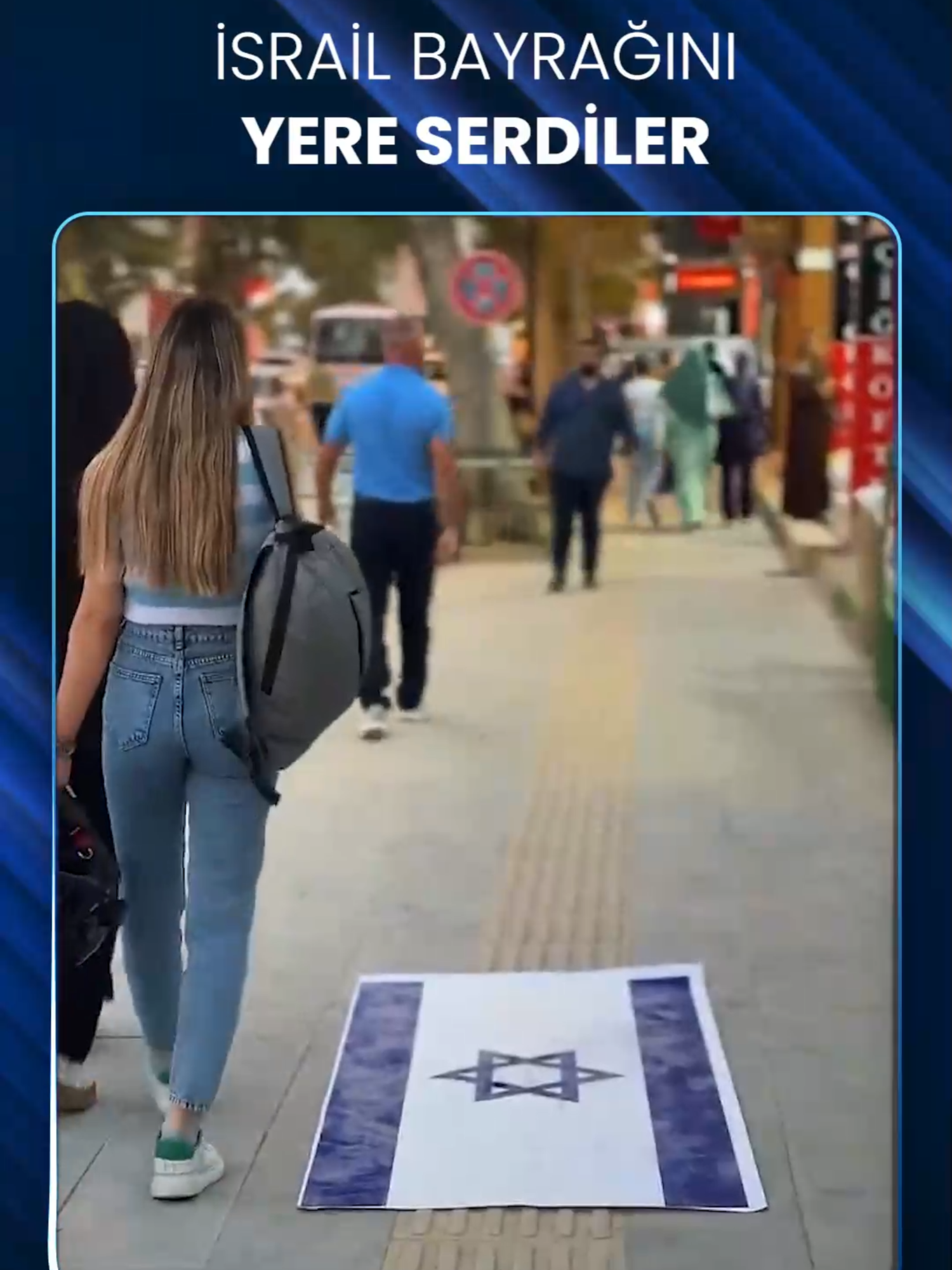 İSRAİL BAYRAĞINI YERE SERDİLER   Adıyaman'da vatandaşlar, katil İsrail'in bayrağını ezerek İsrail'i boykot etti.