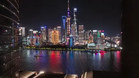 Discover Shanghai's towering giants dancing in the night!💃 Each skyscraper moves to its own rhythm in this symphony of light.#Travel #TravelTips #China #Shanghai #ArchitecturalMarvels