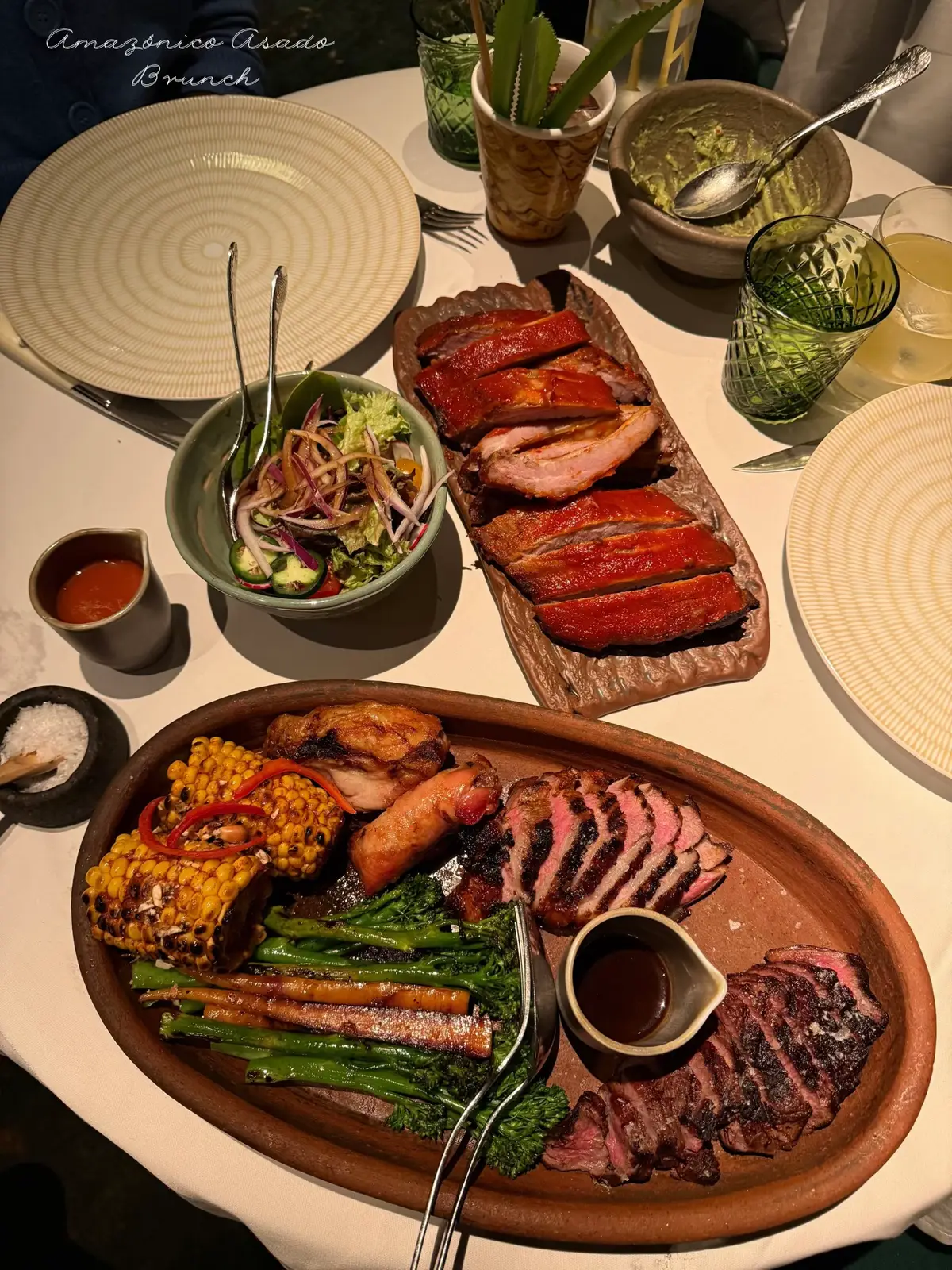Been to Amacónico Mayfair a few times and the Amazónico Asado menu is now my favourite! There’s a great variety and amount of good quality food so you definitely get your money’s worth. It’s £65pp and includes:  🍃Bites  - Pão de Queijo - Guacamole 🍃Starters - Ensalada Amazónico- - Aguachile - Maki Especial 🍃Grilled Meat Platter  - Picanha de Res - Picanha de Cordero - Chancho - Picanton Caipira 🍃Sides - Broccoli y Zanahoria - Ensalada Mixta - Mazorca 🍃Dessert - Guineo The food was delicious and there’s not a dish I didn’t like. Had a few favourites like the maki, Amazónica salad, grilled meat platter and Amazónico-inspired banana split. Also enjoyed the cocktails we had- Jungle Bell Mojito (£25) and Save The Jungle (£16).The service was really good and there’s also live entertainment throughout the meal.  Would I have this again? Yes! Latin American food in London| Mayfair restaurant| London brunch | pretty restaurants in London| brunch restaurant London #londonfood #londonrestaurants #londonbrunch #mayfair #londonhotspots 