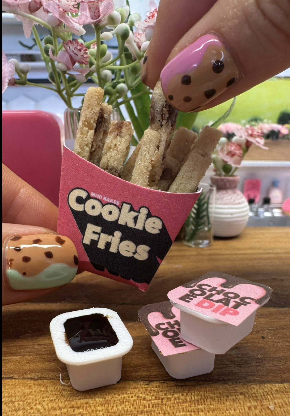 Fresh out of the oven — Cookie Fries straight from the Mini Bakes Kitchen, served with chocolate dipping sauce ! Crispy edges, soft centers, and perfect for dunking. 😍✨ Would you dip yours in chocolate, caramel, or something extra fun? 👩‍🍳 What fries should I bake next — sweet or savoury?   #CookieFries #DessertFries #ChocolateDip #MiniBakesKitchen #FoodieFaves     